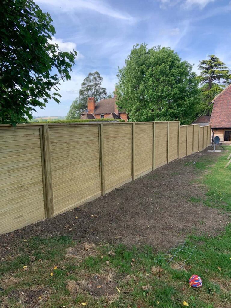 This is a photo of an acoustic fence installed by Sevenoaks Fencing Services